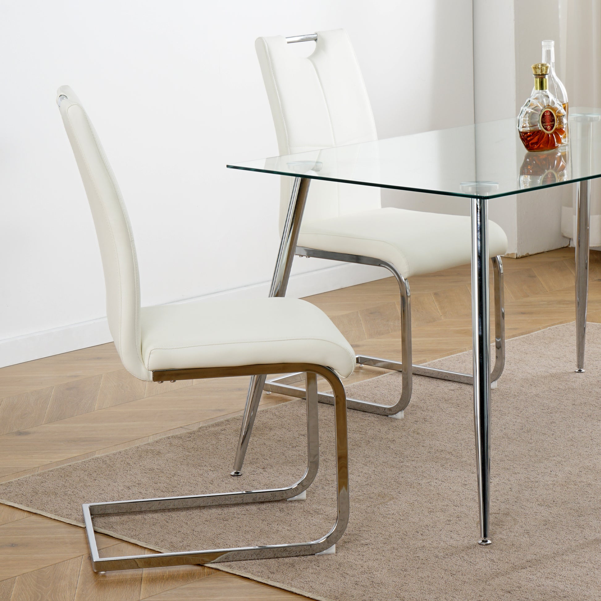 White faux leather cantilever dining chair with chrome legs