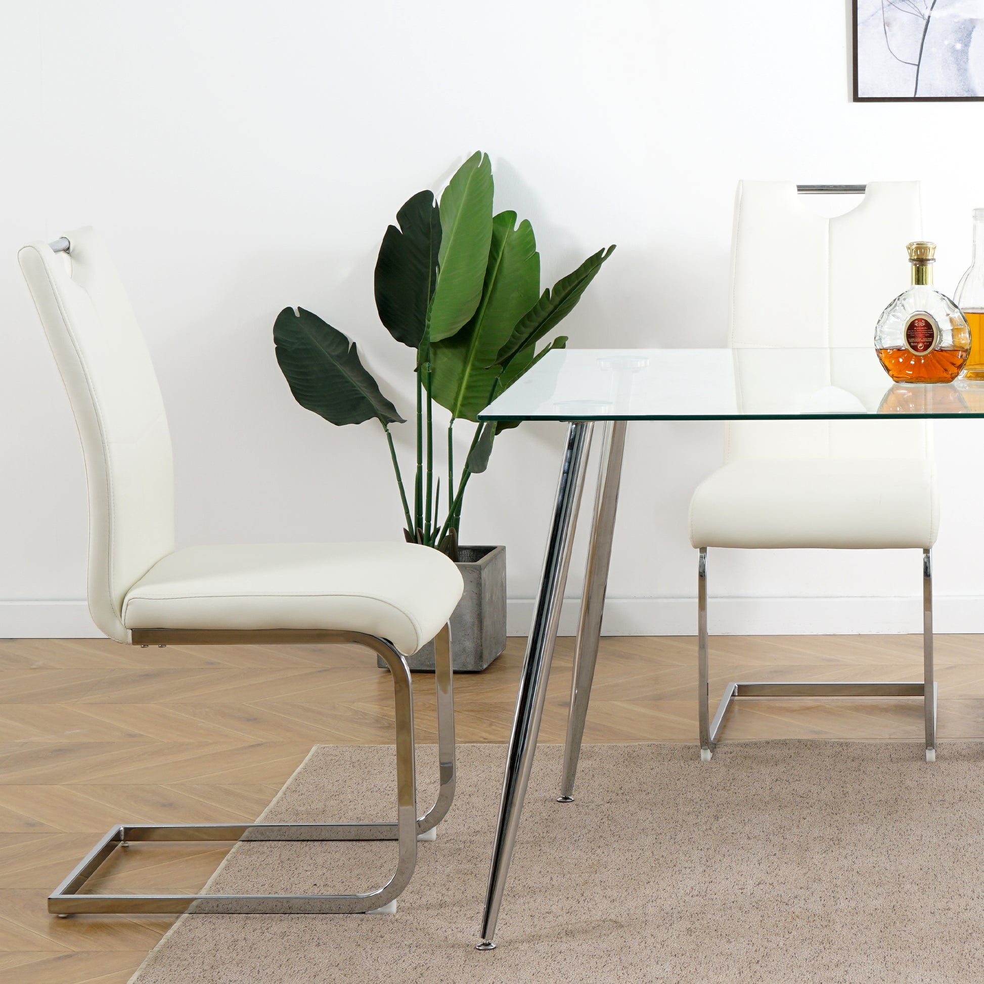 White faux leather dining chair with chrome legs