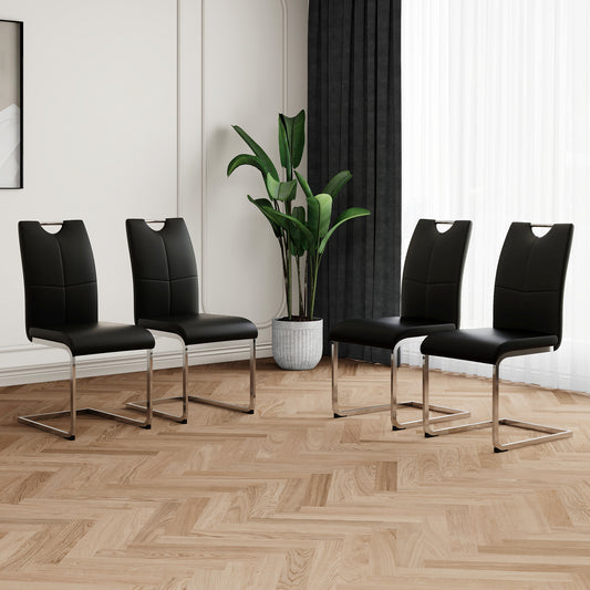 Set of four black faux leather dining chairs with chrome sled legs