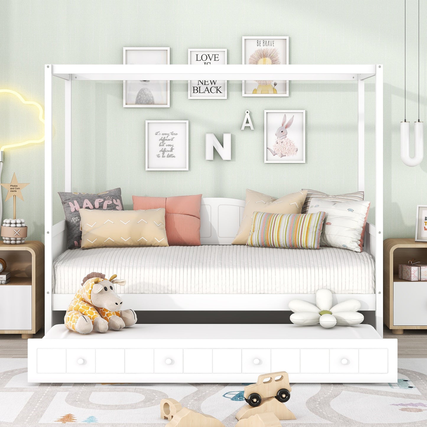 White modern canopy bed with stuffed giraffe toy and colorful pillows