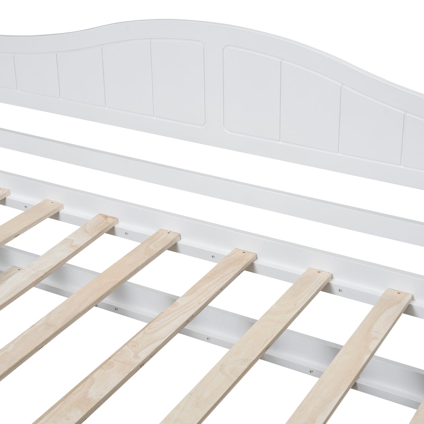 Closeup of white wooden daybed frame with slatted base