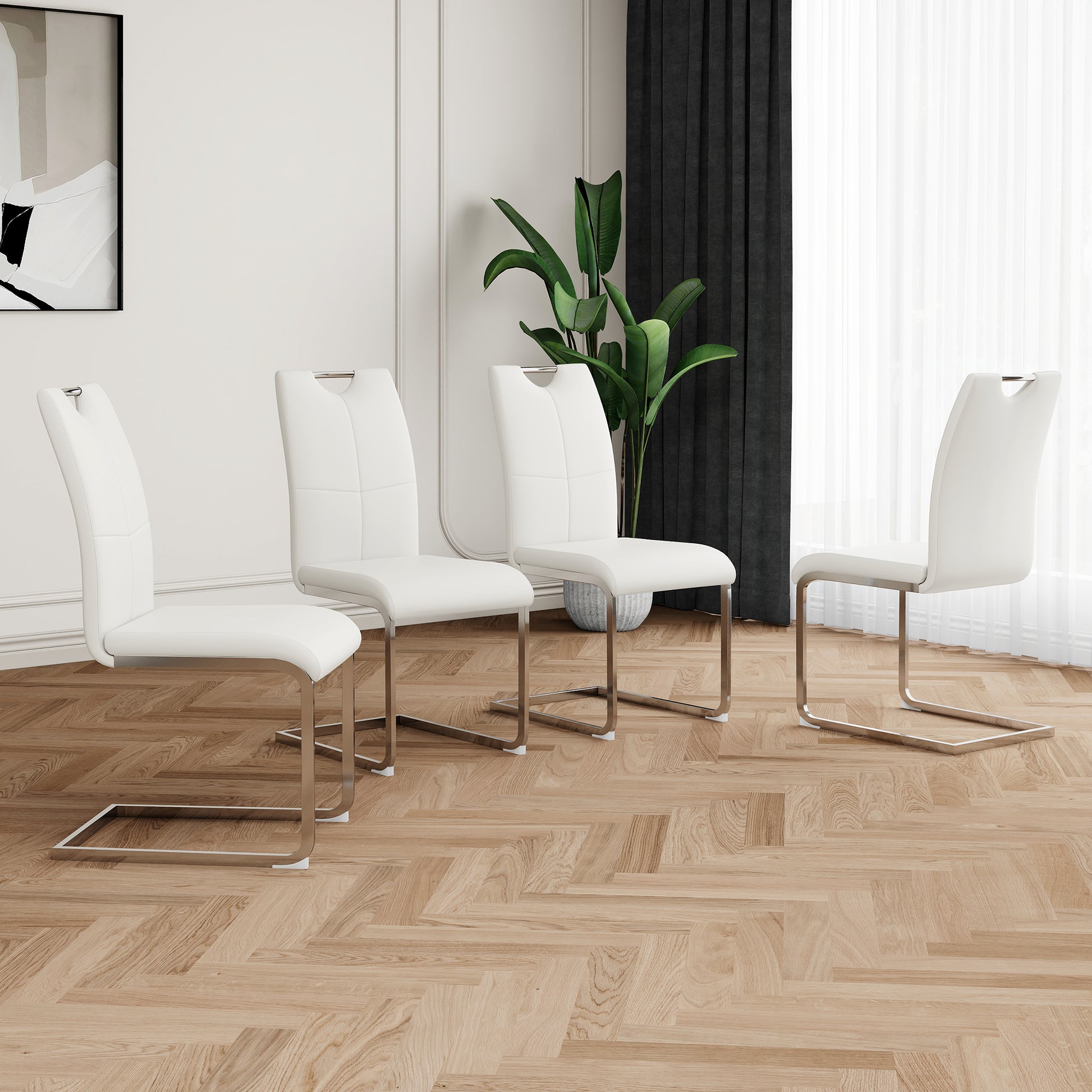 White faux leather dining chairs with chrome sled legs