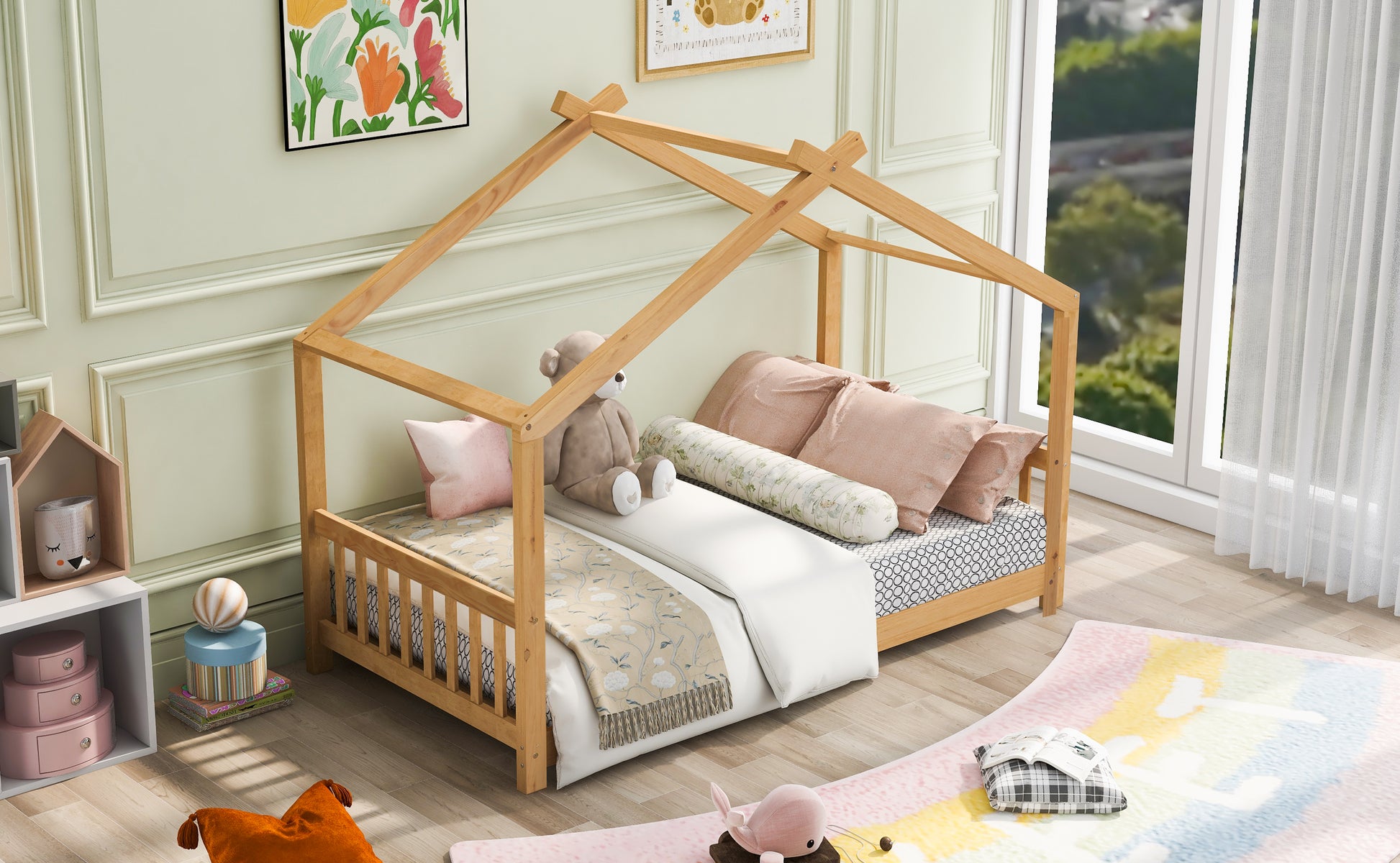 Wooden house frame bed with floral blanket and pink pillows