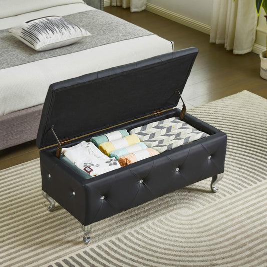 Black faux leather storage ottoman with crystal tufting and silver legs