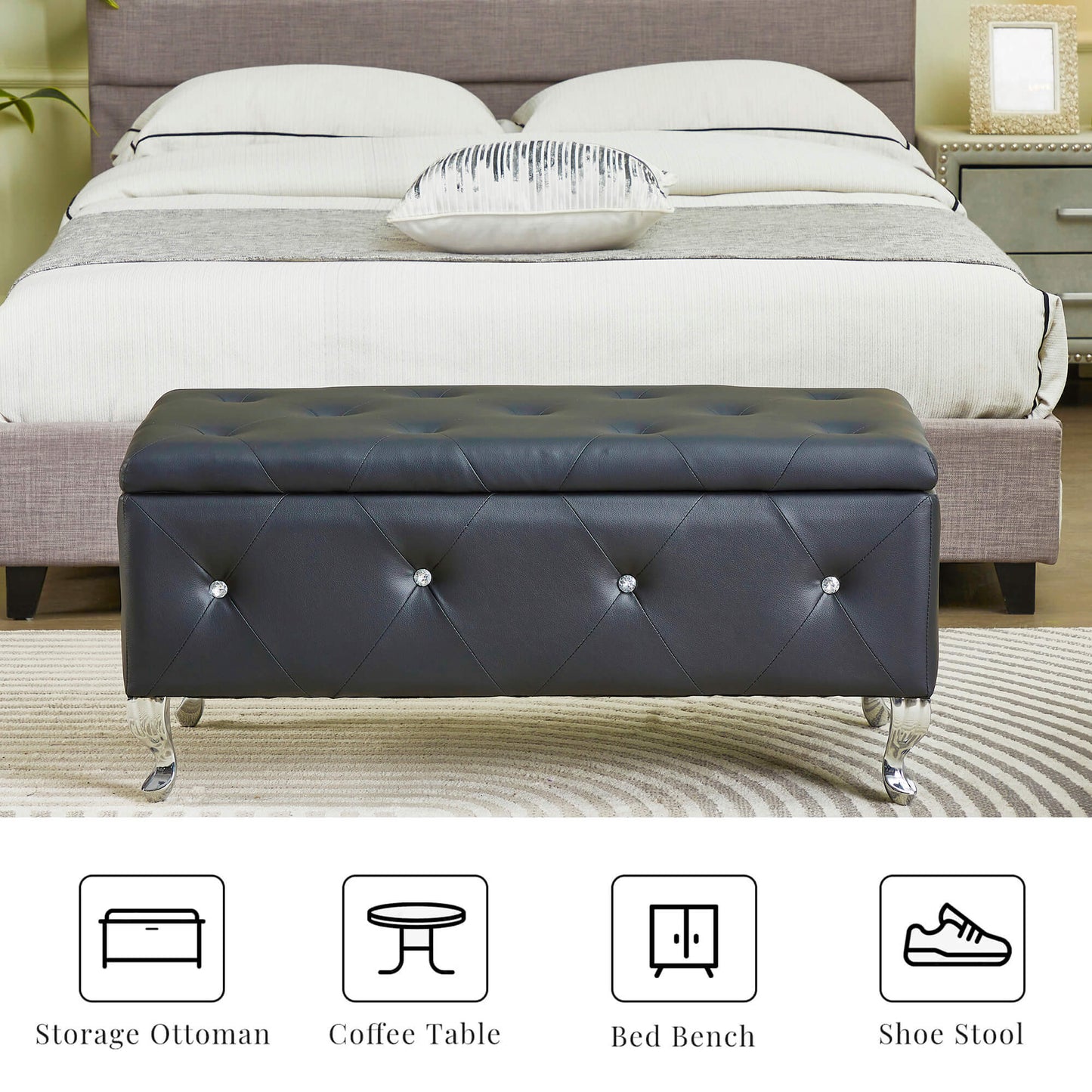 Black tufted storage ottoman with crystal accents and chrome legs at foot of bed