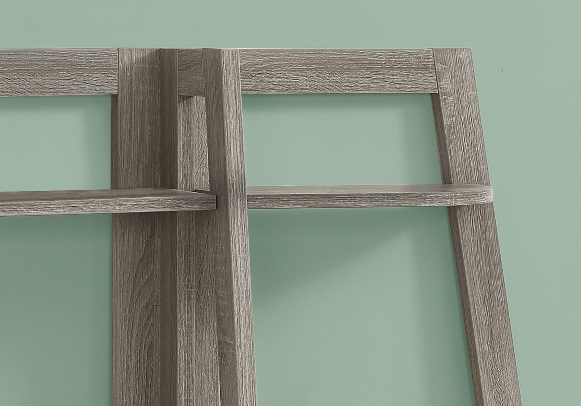 Closeup of rustic grey wood ladder shelf detail