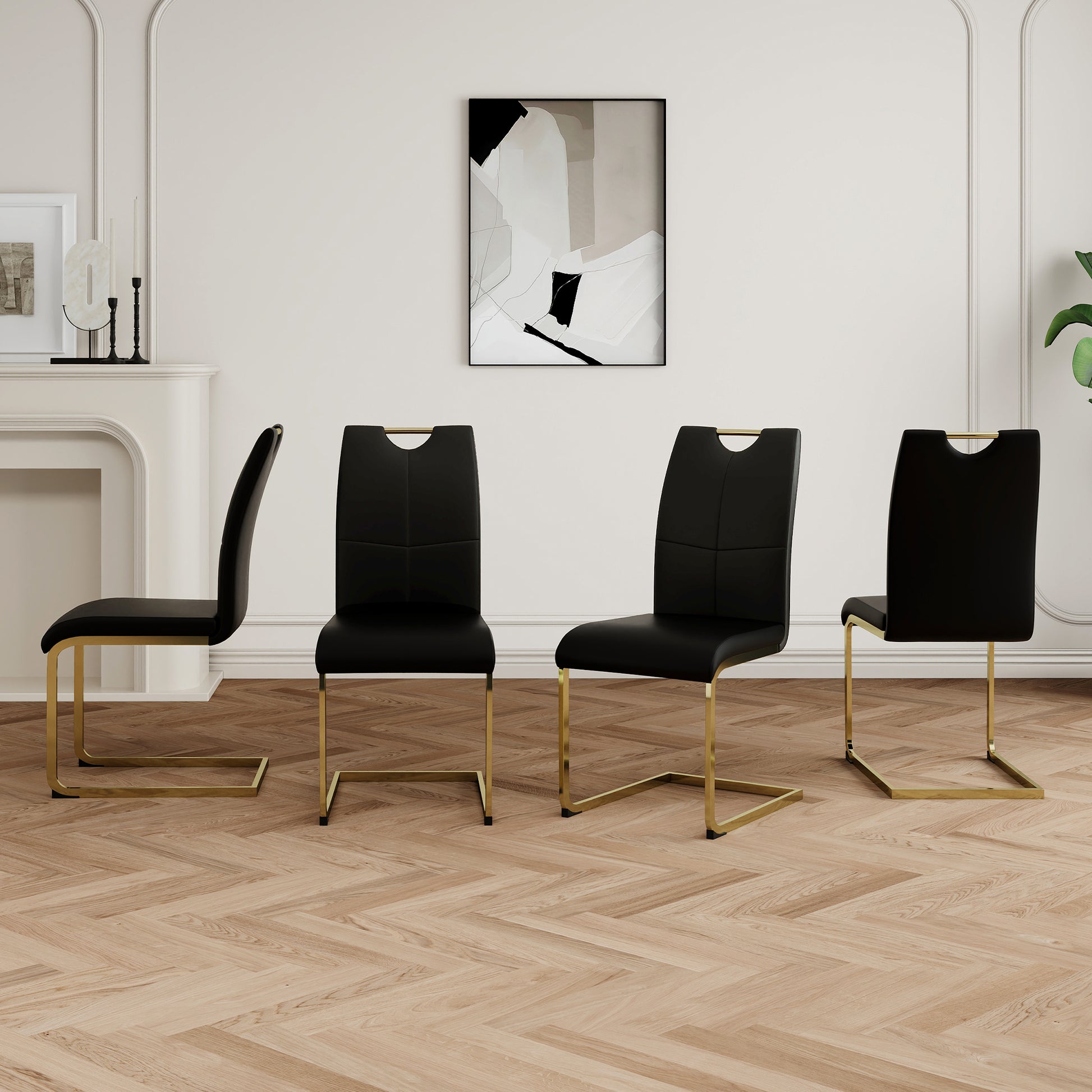 Black upholstered dining chair with gold sled legs