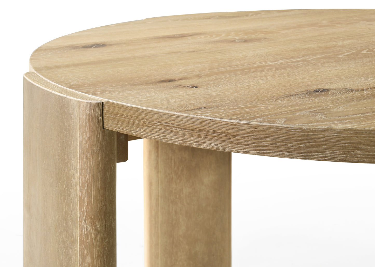 Modern round oak dining table with natural wood grain detail