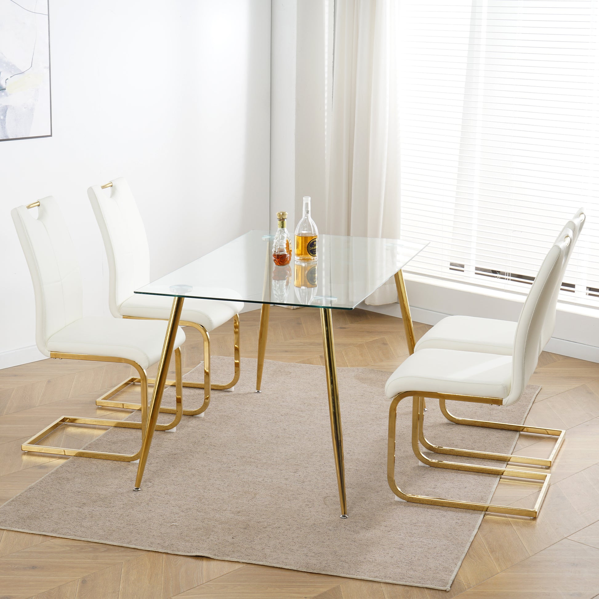 Modern glass dining table with gold legs