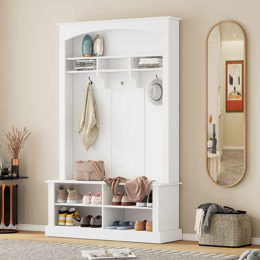 White entryway organizer with shoe storage and coat hooks