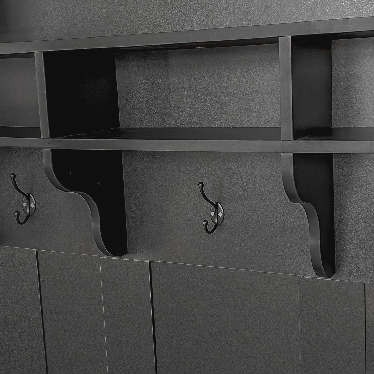 Black hall tree with coat hooks and shelf