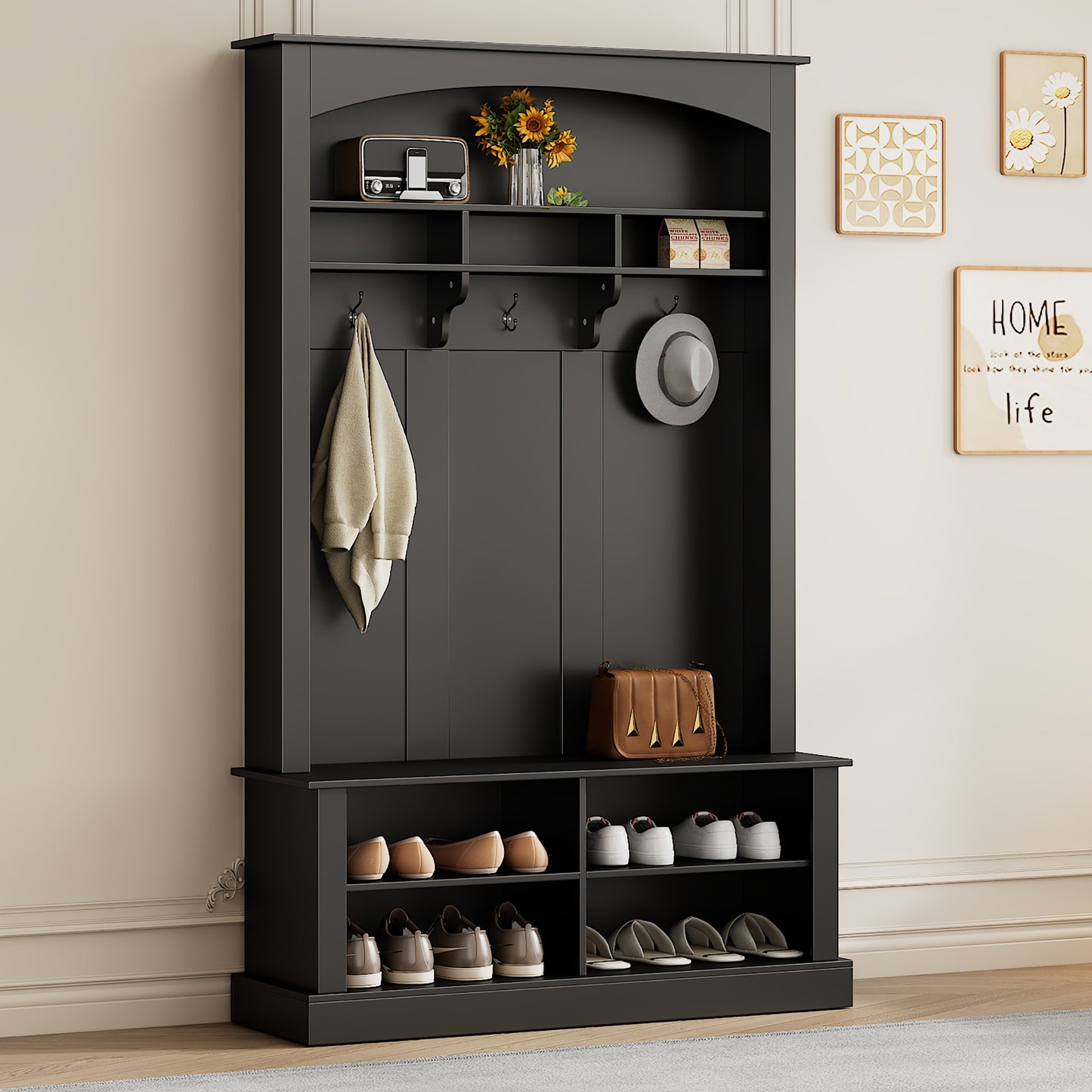Black entryway hall tree with shoe storage bench and coat hooks
