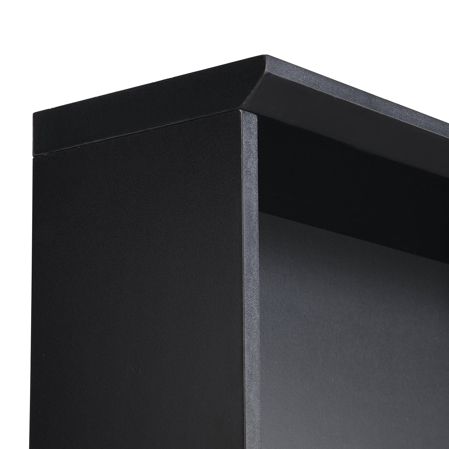 Closeup of black laminate bookshelf corner with textured finish