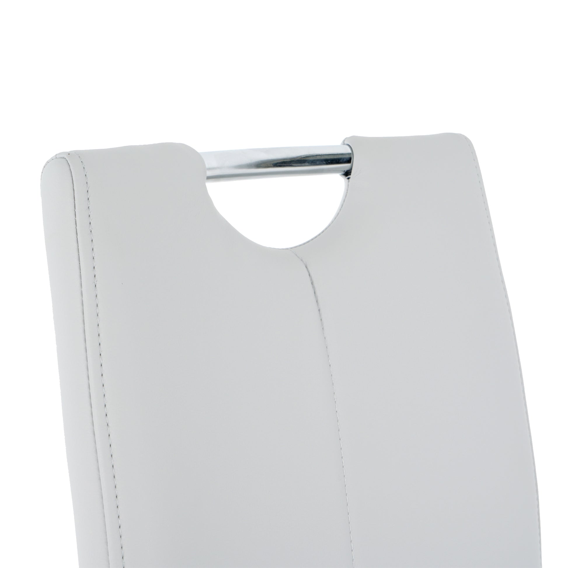 Close up of white faux leather dining chair back with chrome handle