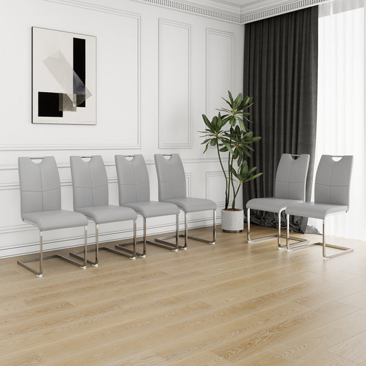 Six grey faux leather dining chairs with chrome sled bases