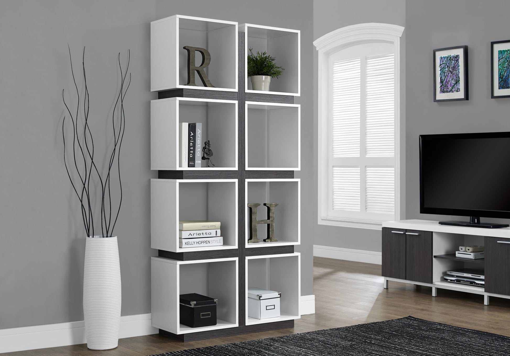 Modern white cube bookshelf with dark wood accents and open shelving