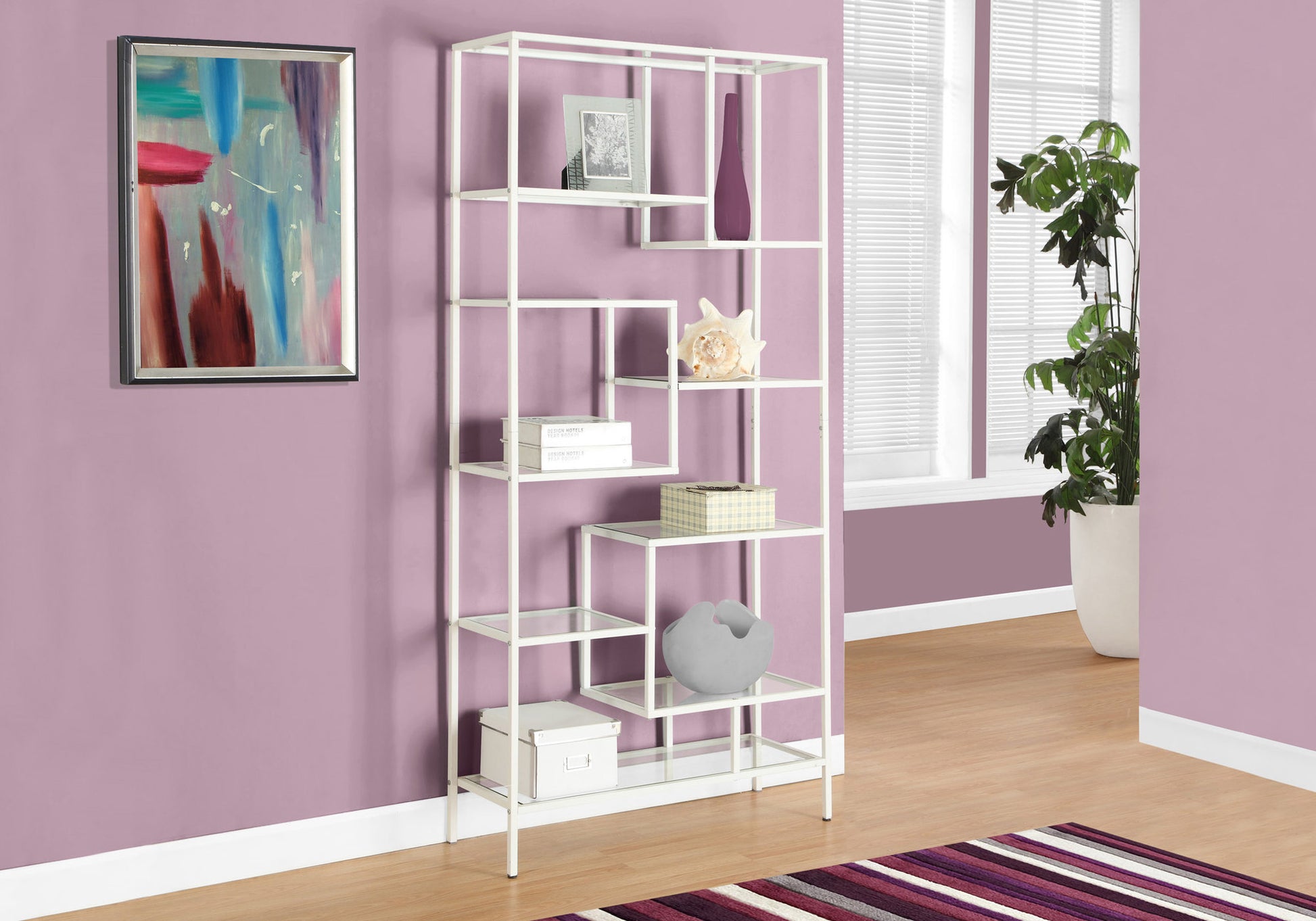 White metal geometric shelving unit with glass shelves
