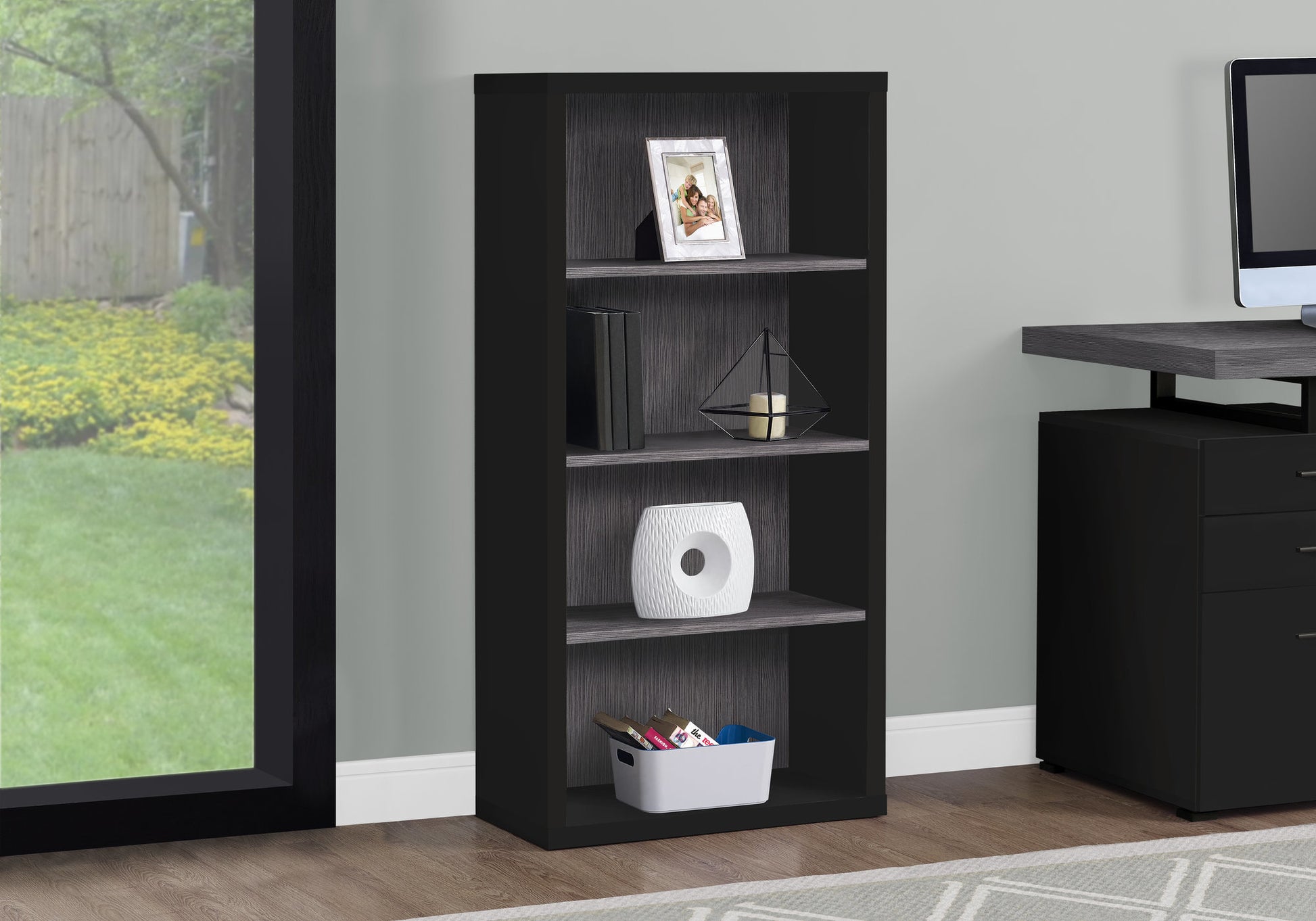 Black fourshelf bookcase with grey woodgrain shelves