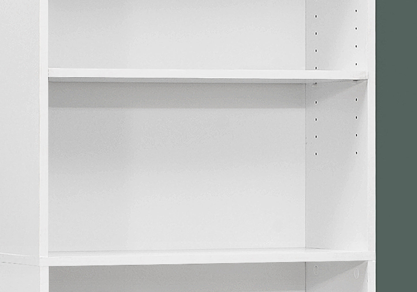 White particleboard bookshelf with adjustable shelf pegs