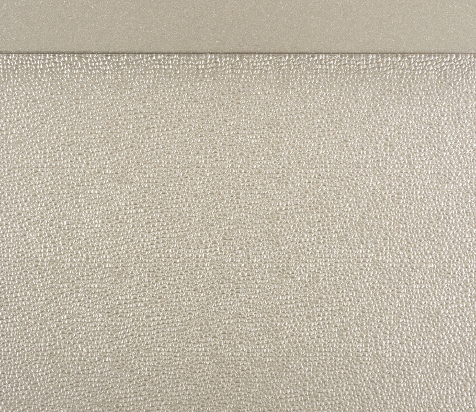 Textured champagne metallic wallpaper with a raised pebble pattern
