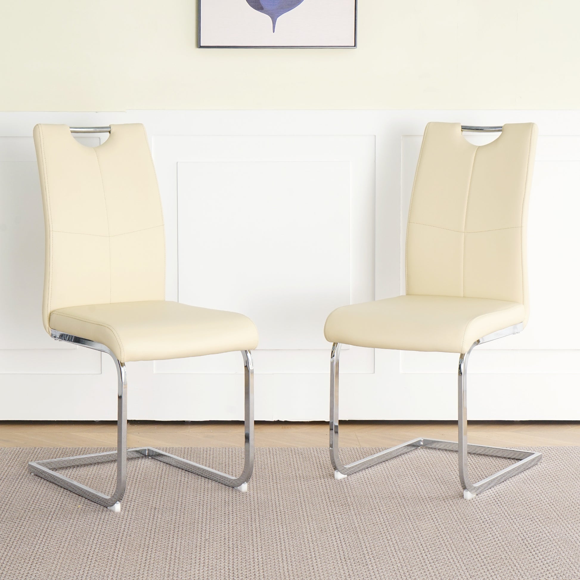 Cream faux leather dining chair with chrome cantilever base