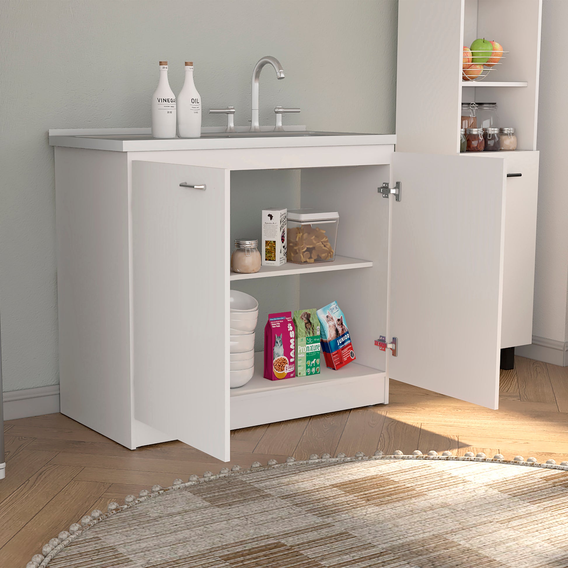 White kitchen sink cabinet with open doors