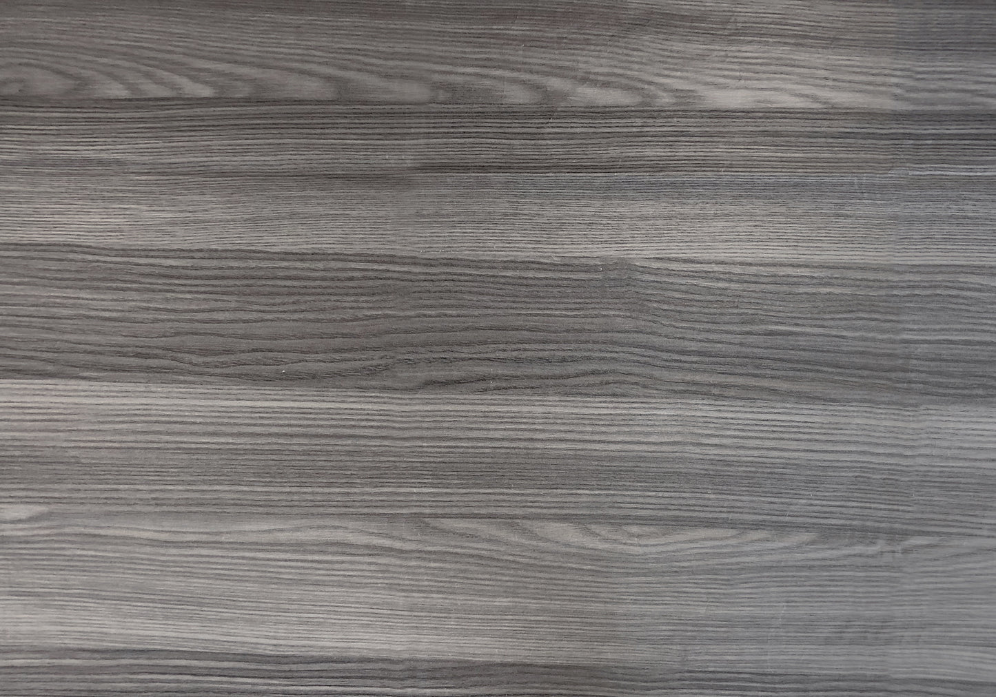 Textured grey wood laminate sheet with visible grain