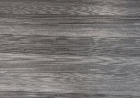 Textured grey wood laminate sheet with visible grain