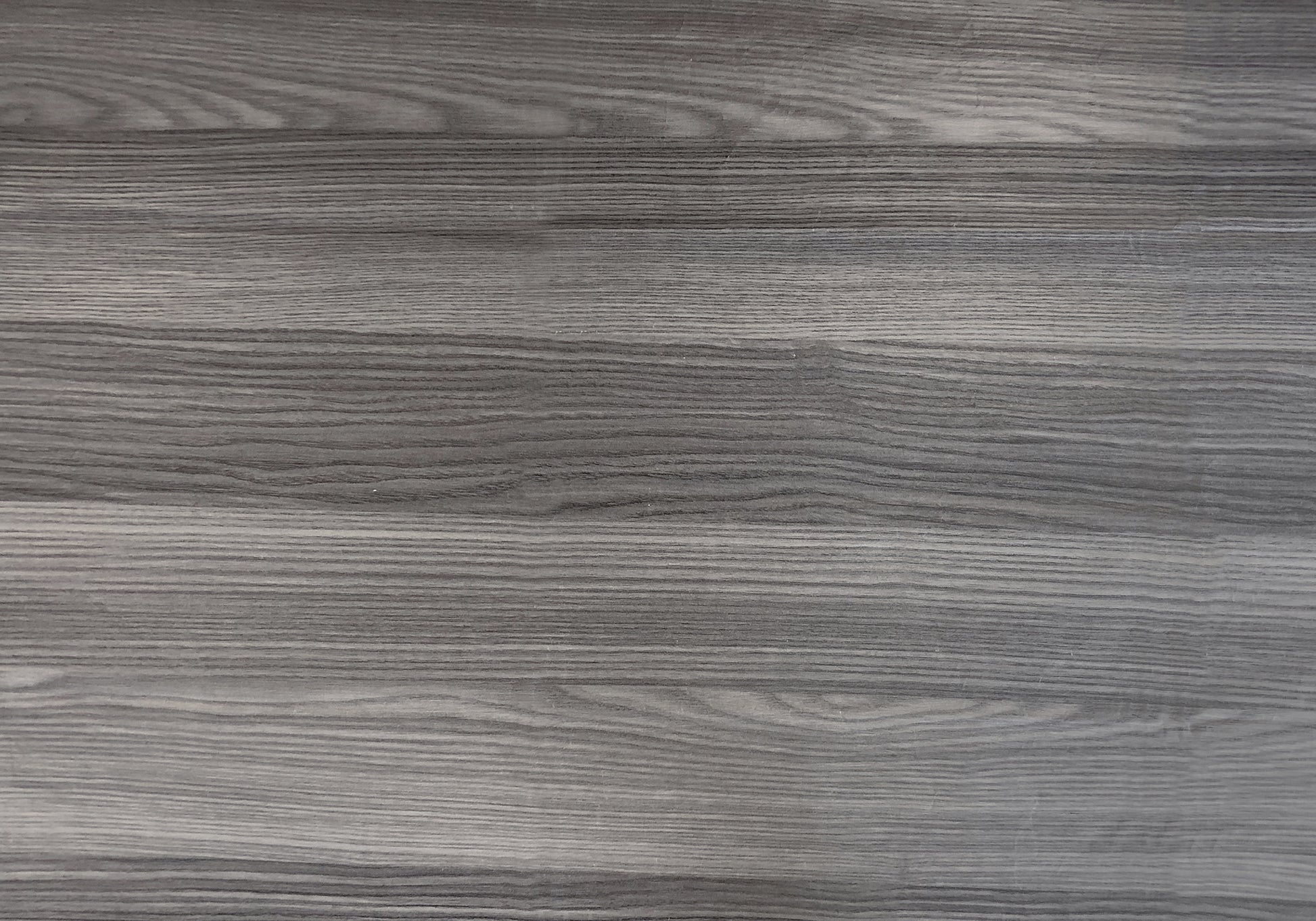 Dark grey wood grain laminate sample