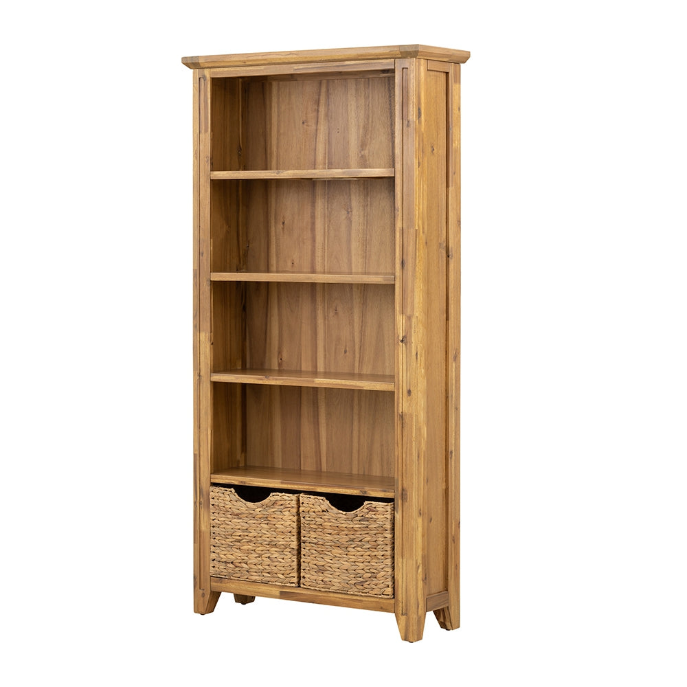 Tall natural wood bookshelf with four shelves and two woven basket drawers