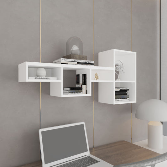Modern white wall shelf with cube compartments holding books and decor