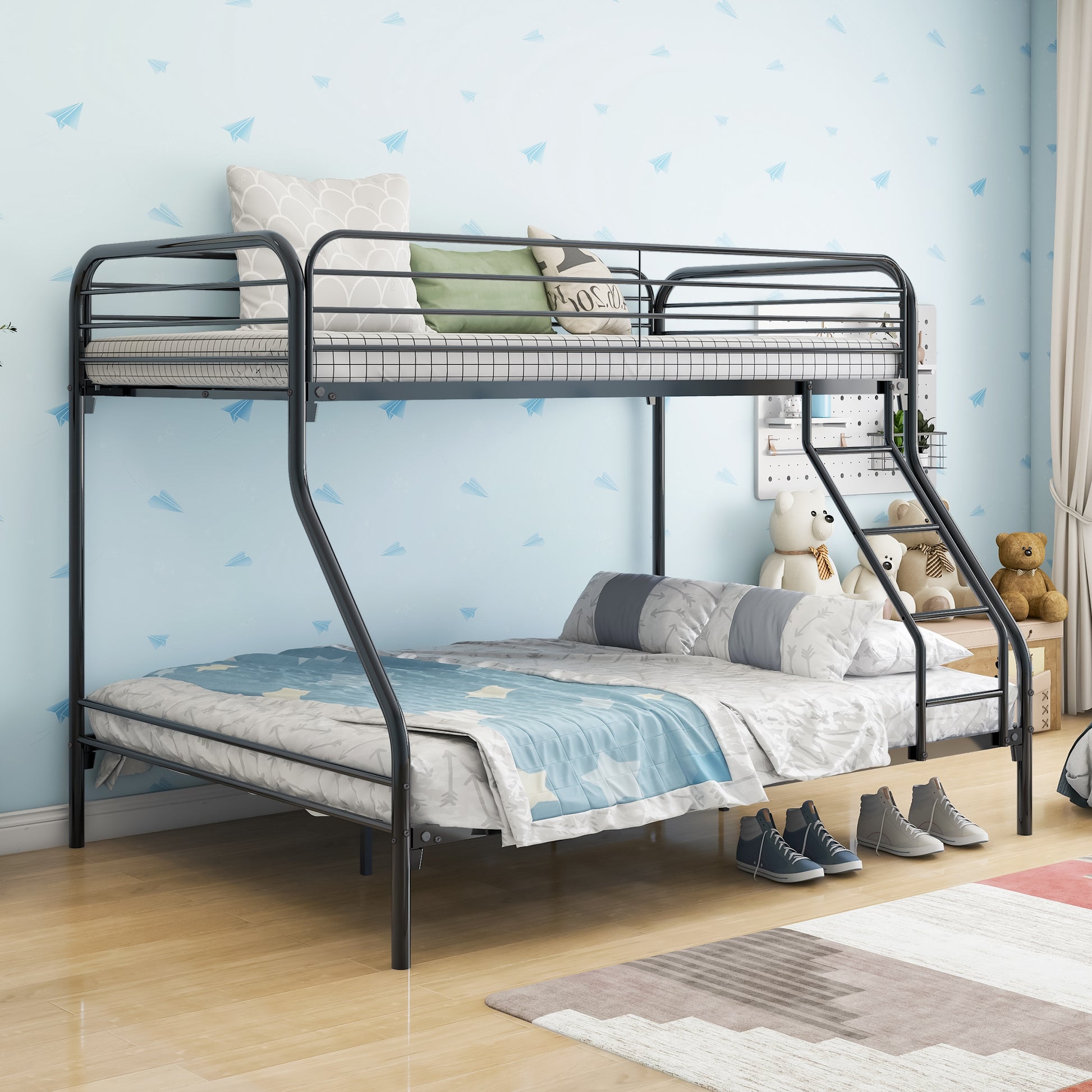 Black metal twin over twin bunk bed with ladder and bedding
