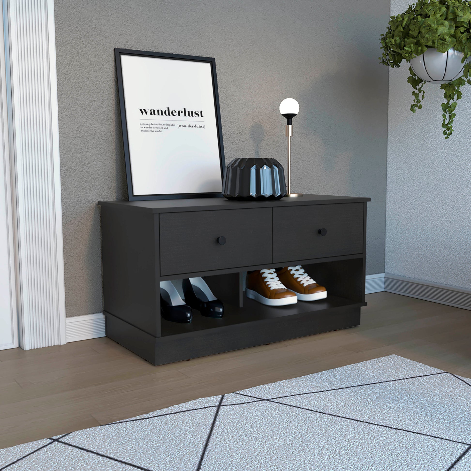 Dark wood entryway bench with two drawers and open shelves holding black heels and brown sneakers