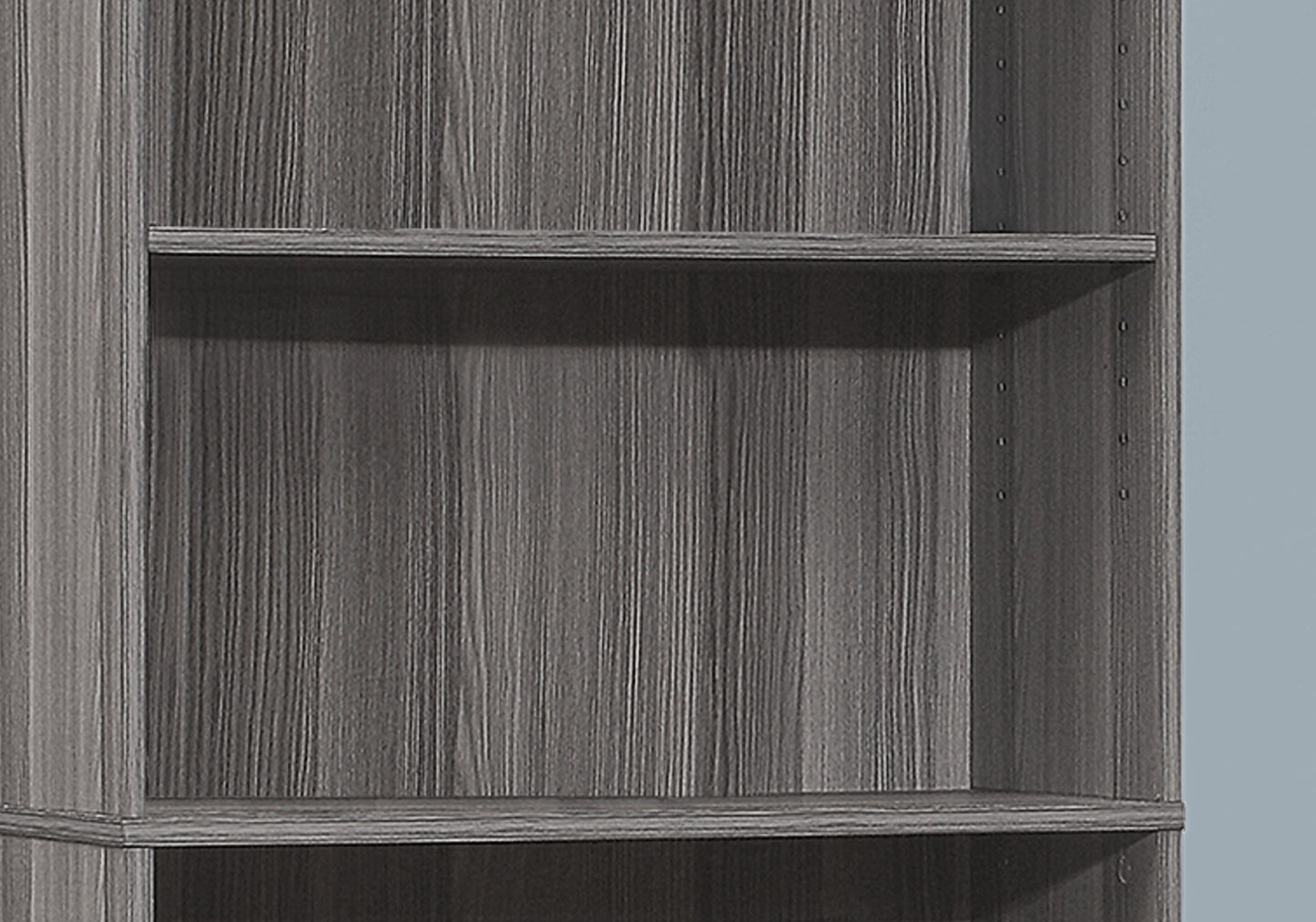 Gray wood grain tall bookshelf with adjustable shelves