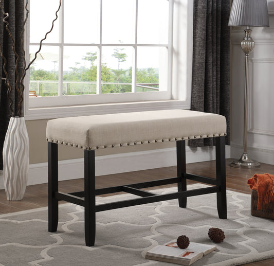 Beige upholstered counter stool with nailhead trim and dark wood legs
