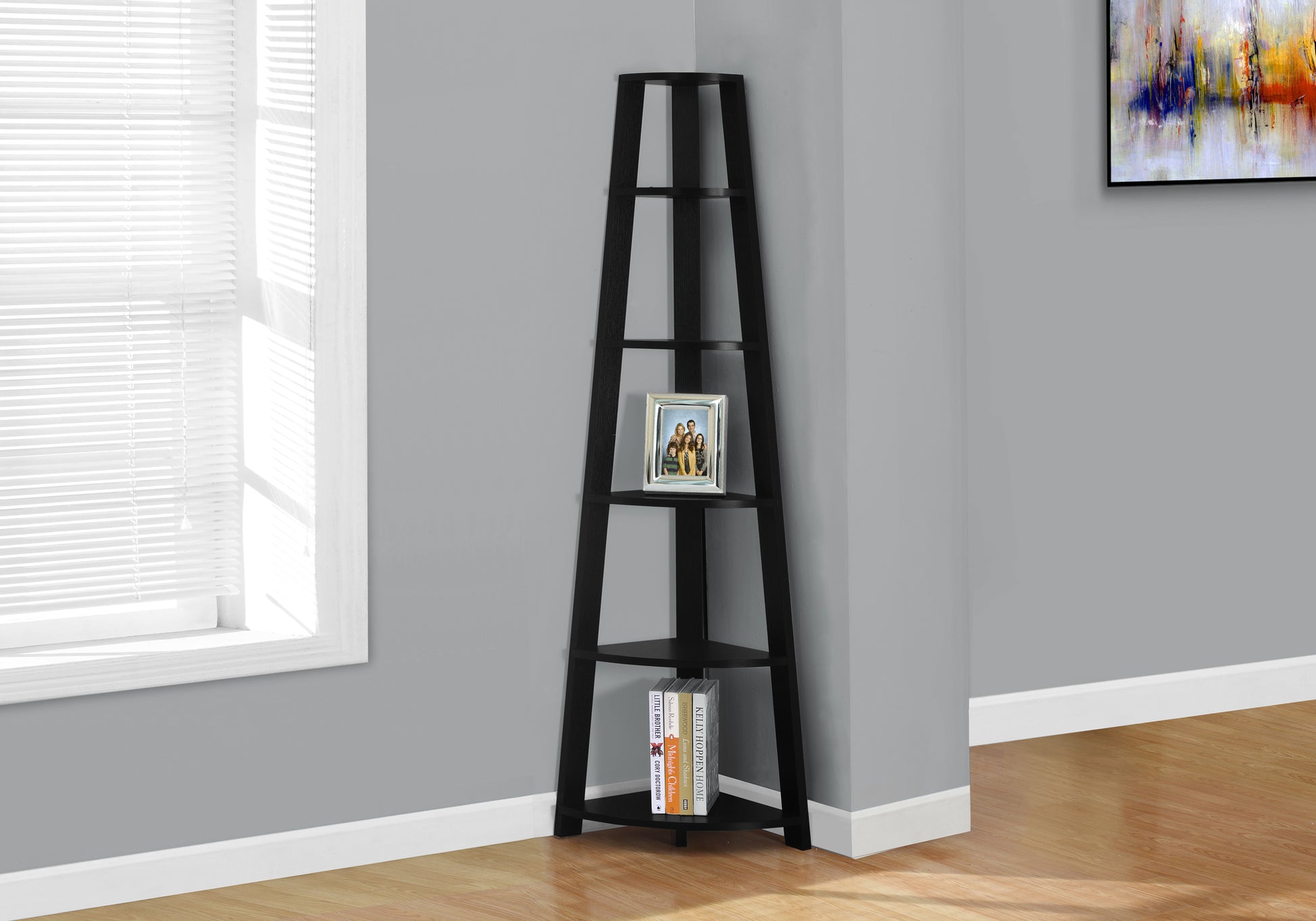 Tall black wood corner shelf with five tiers perfect for small spaces