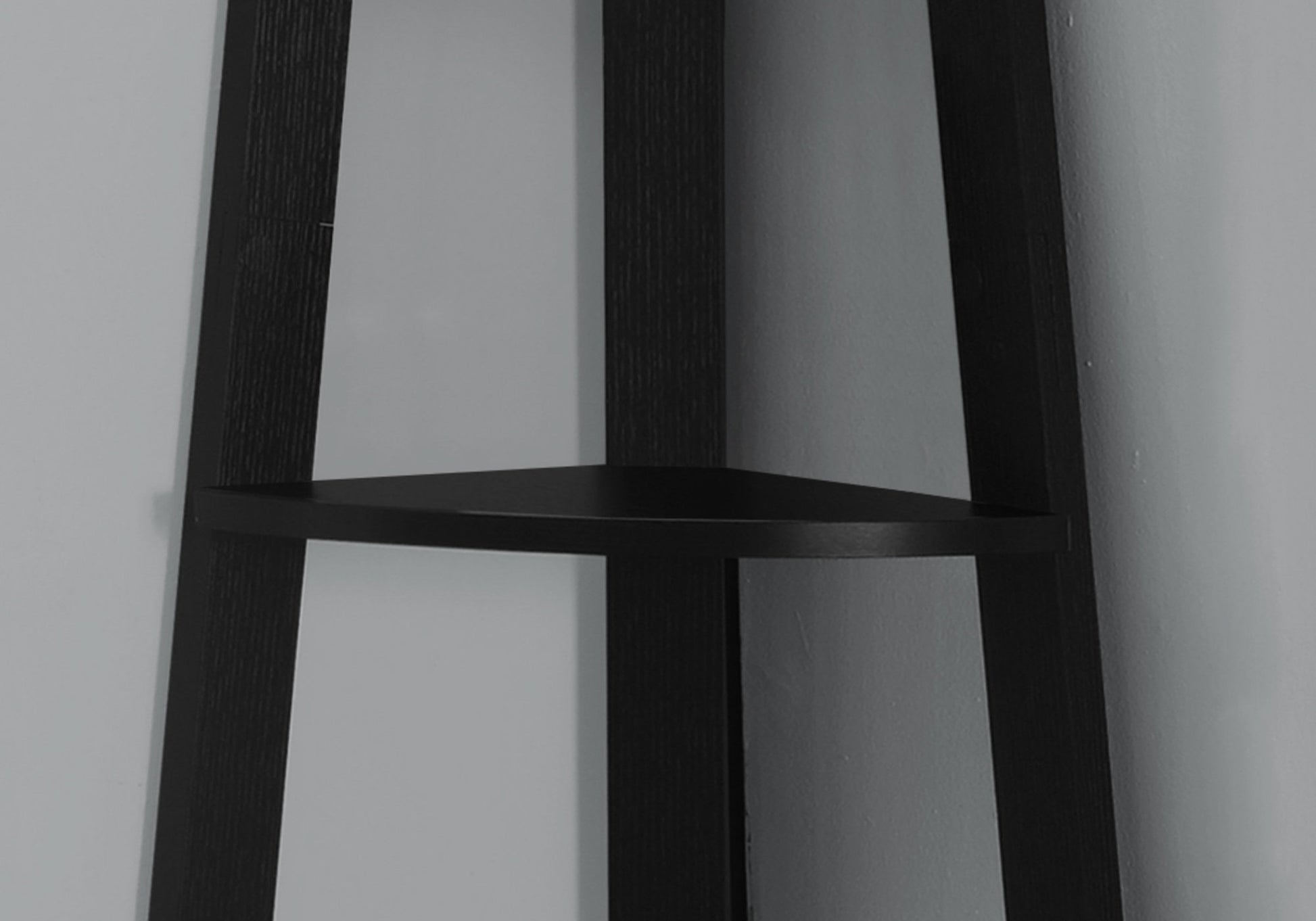 Dark wood corner shelf with textured finish