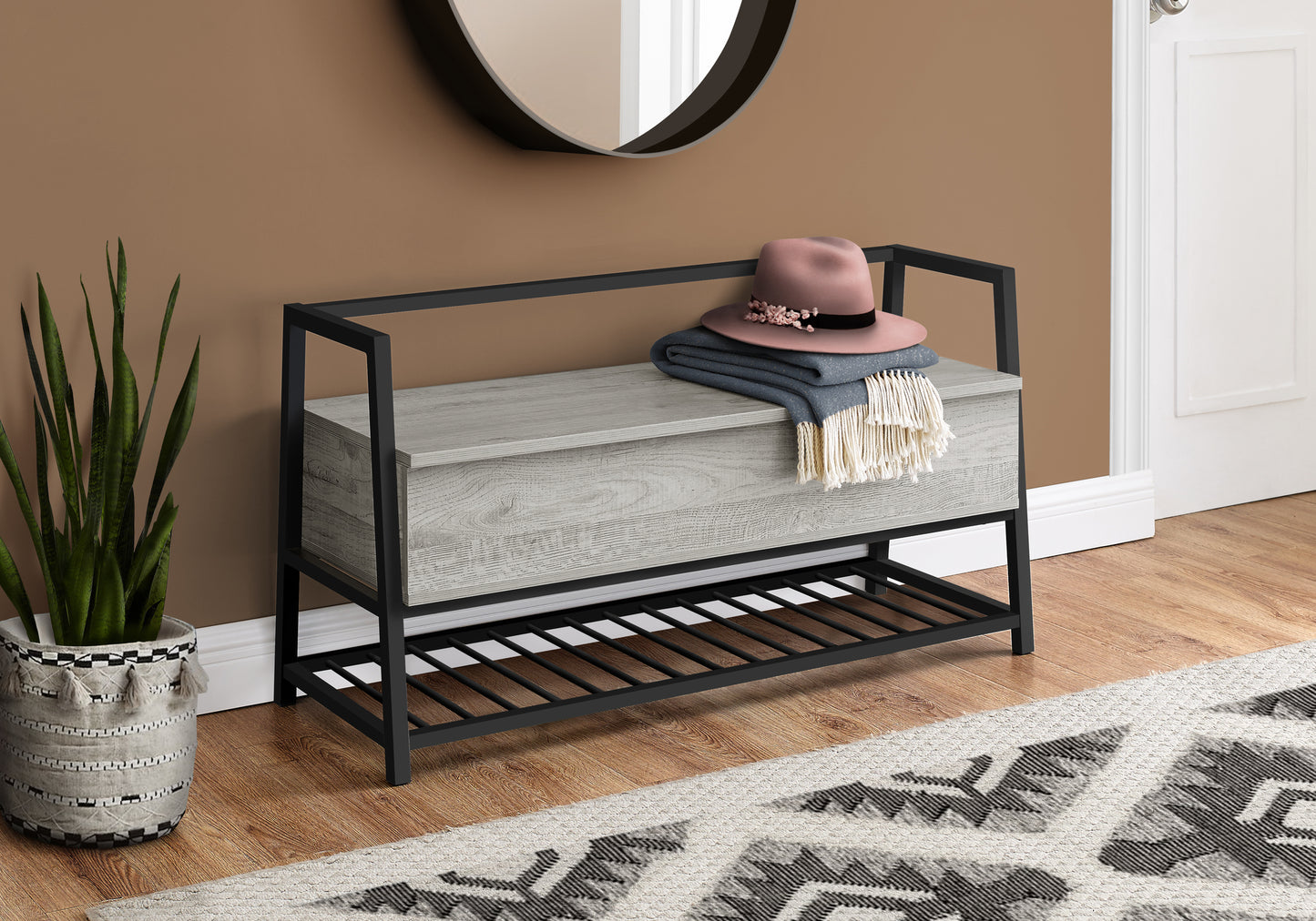 Rustic grey wood storage bench with black metal frame and shoe rack