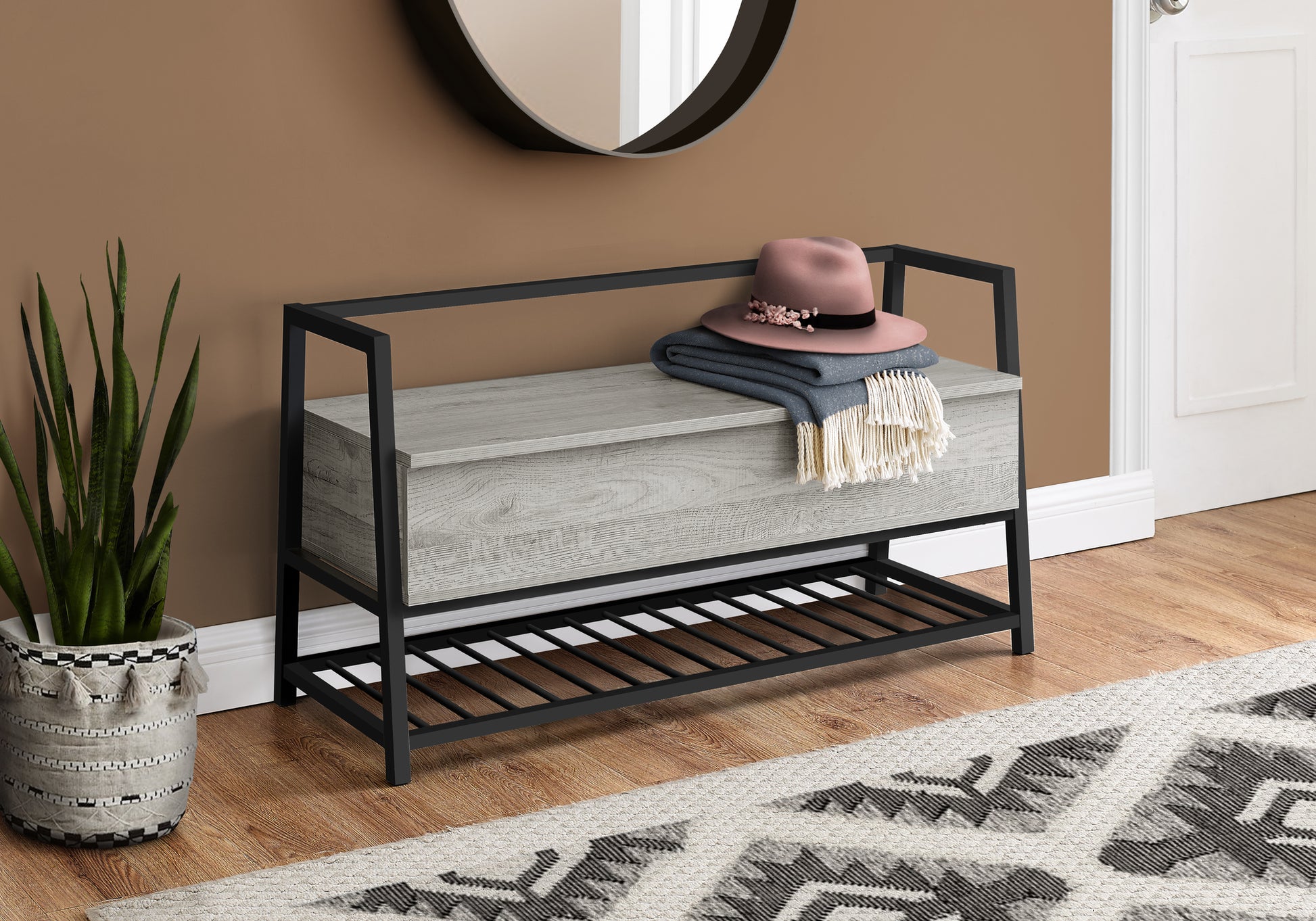 Rustic grey wood storage bench with black metal frame and shoe rack