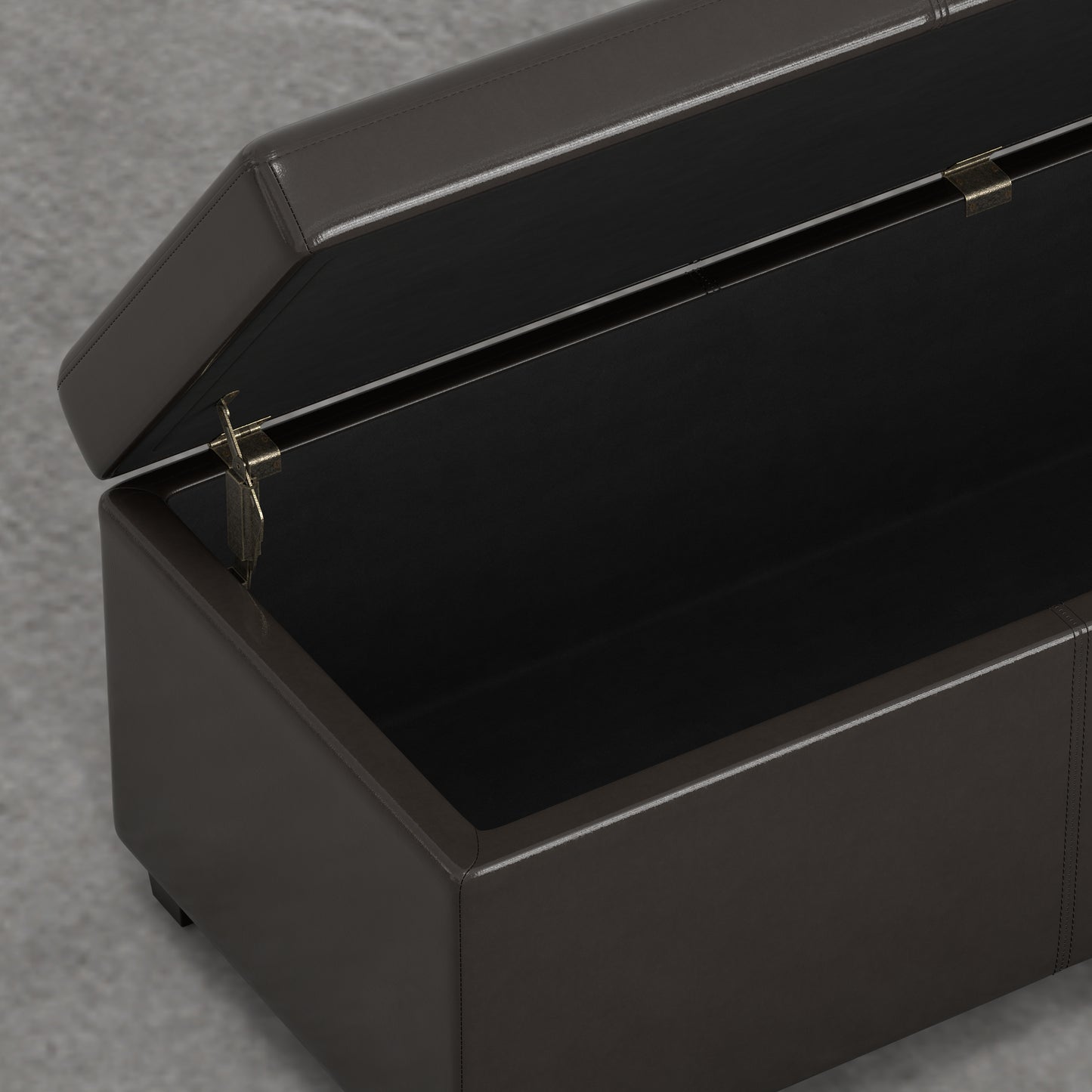 Brown faux leather storage ottoman with open lid revealing black interior