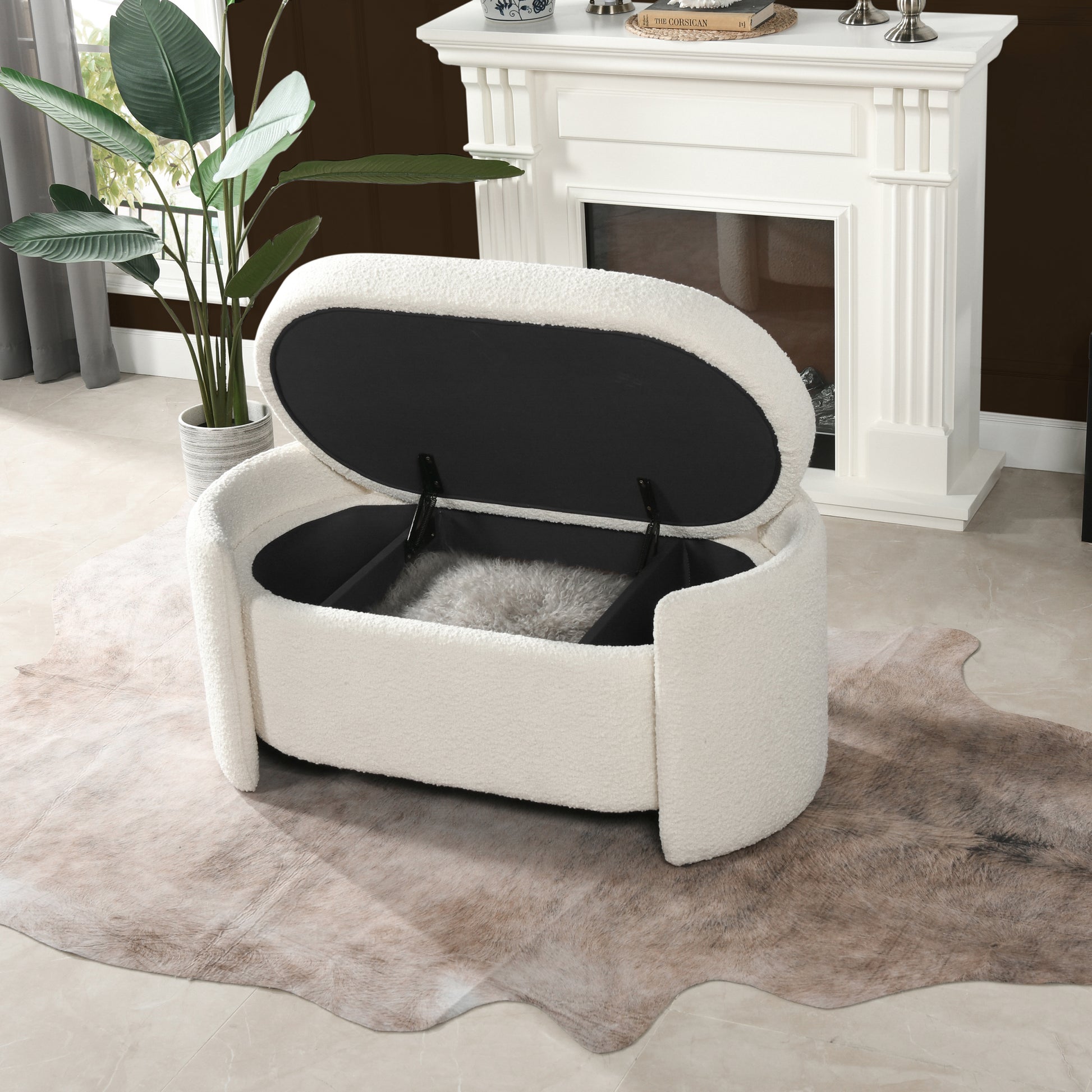 Cream boucle storage ottoman with black interior