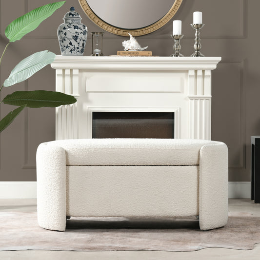 Plush boucle fabric storage ottoman in cream with curved arms and hidden storage