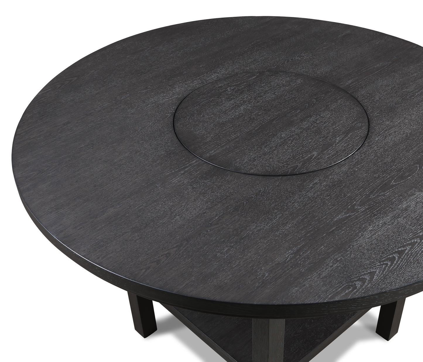 Dark oak round dining table with visible wood grain texture and central inset