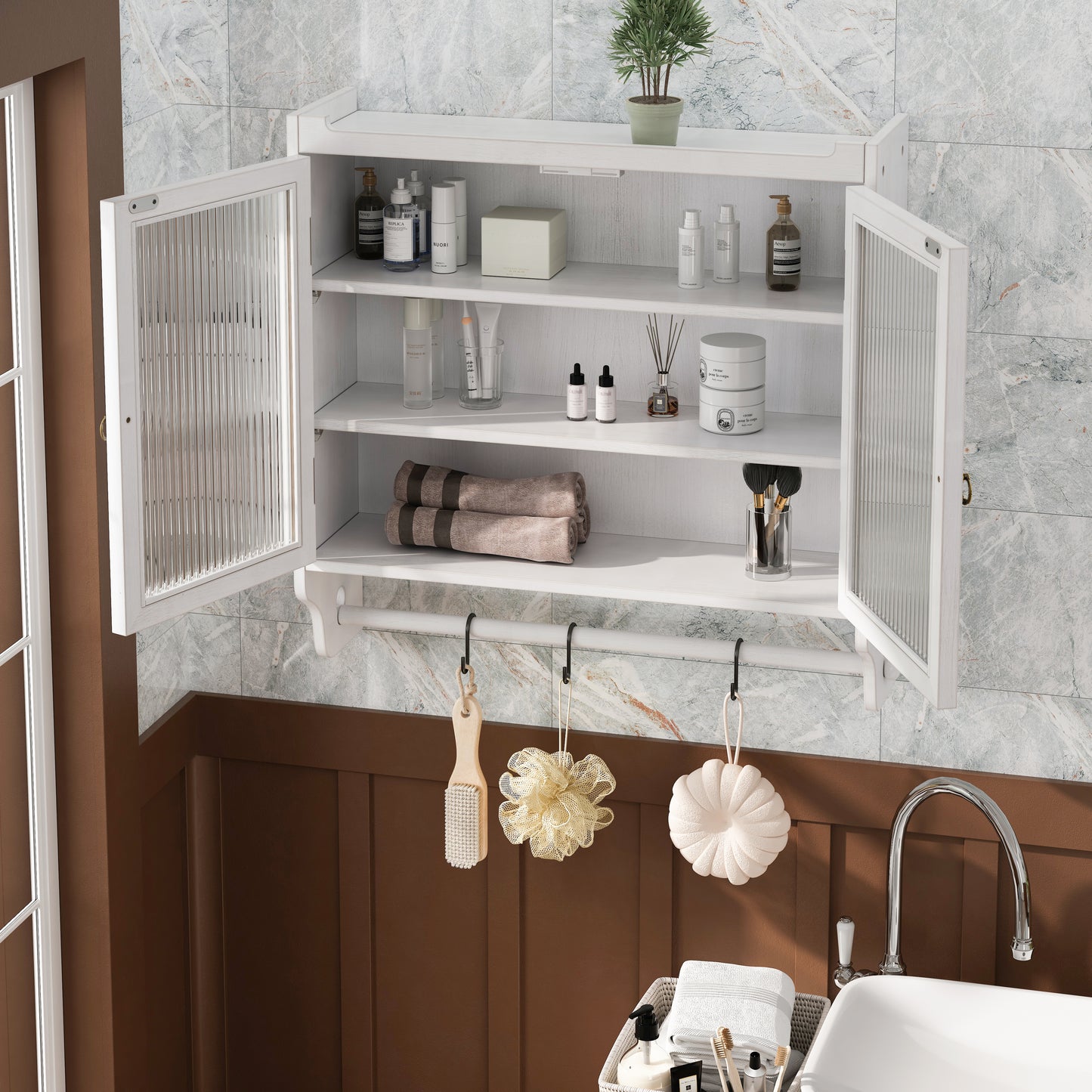 White wooden bathroom cabinet with fluted glass doors and toiletries