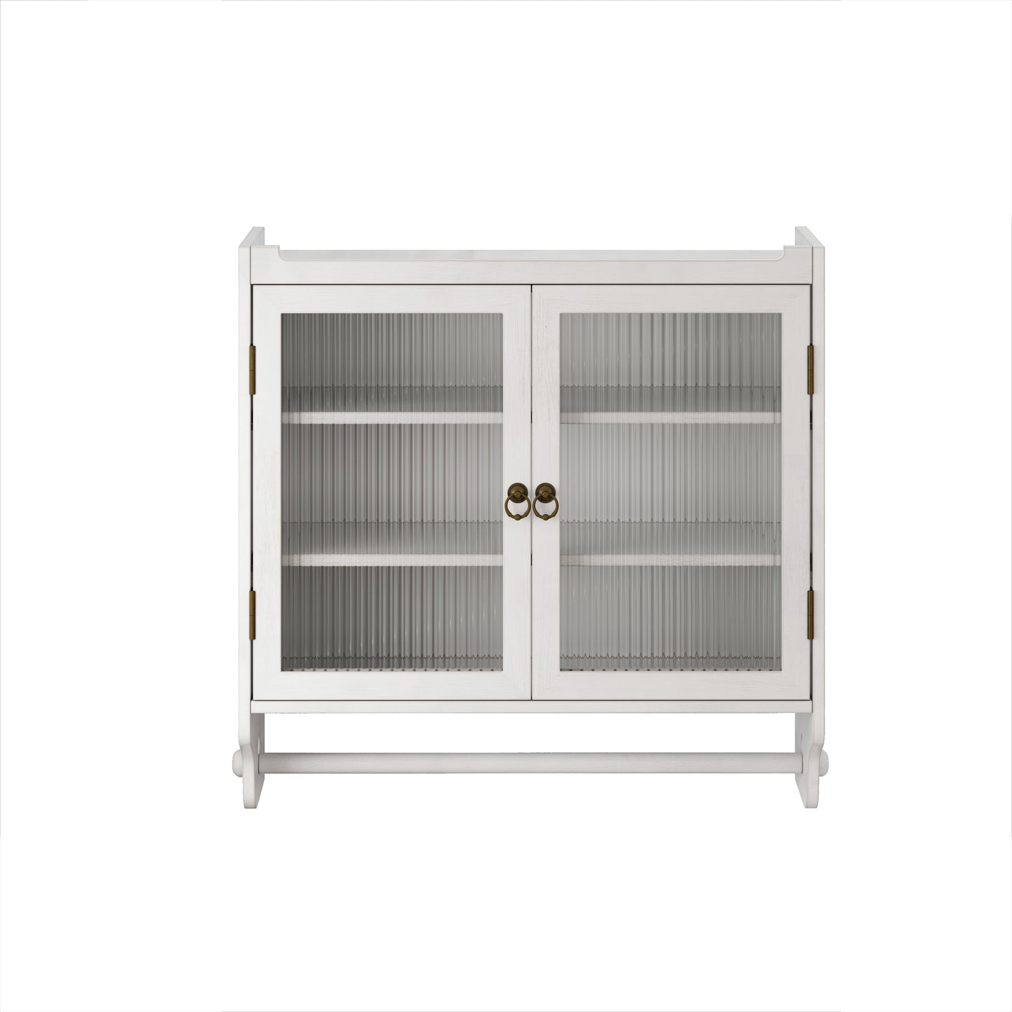 White wooden cabinet with fluted glass doors and brass ring pulls