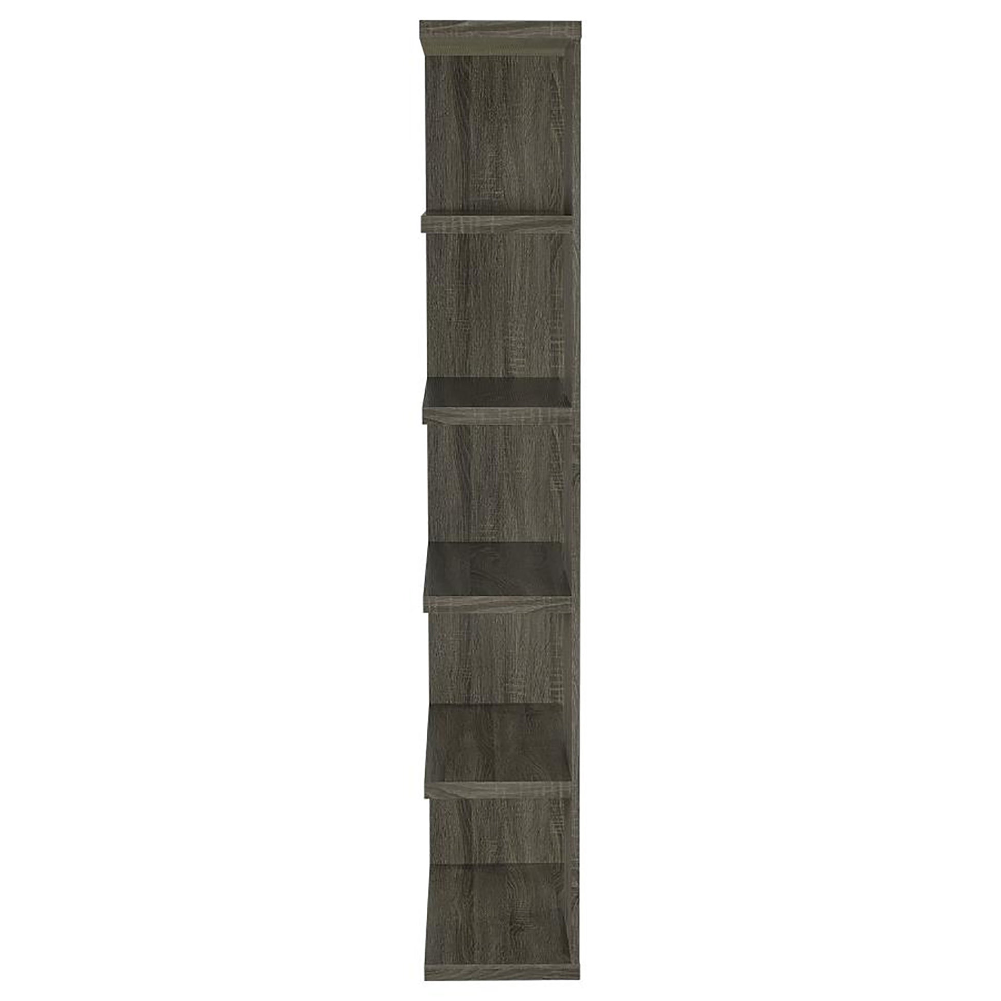 Tall grey wood veneer shelving unit with seven staggered shelves