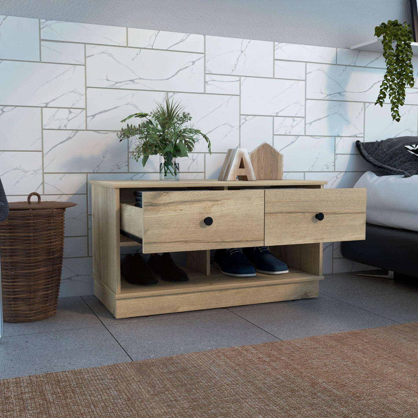 Light oak entryway shoe cabinet with open shelves holding black and blue shoes