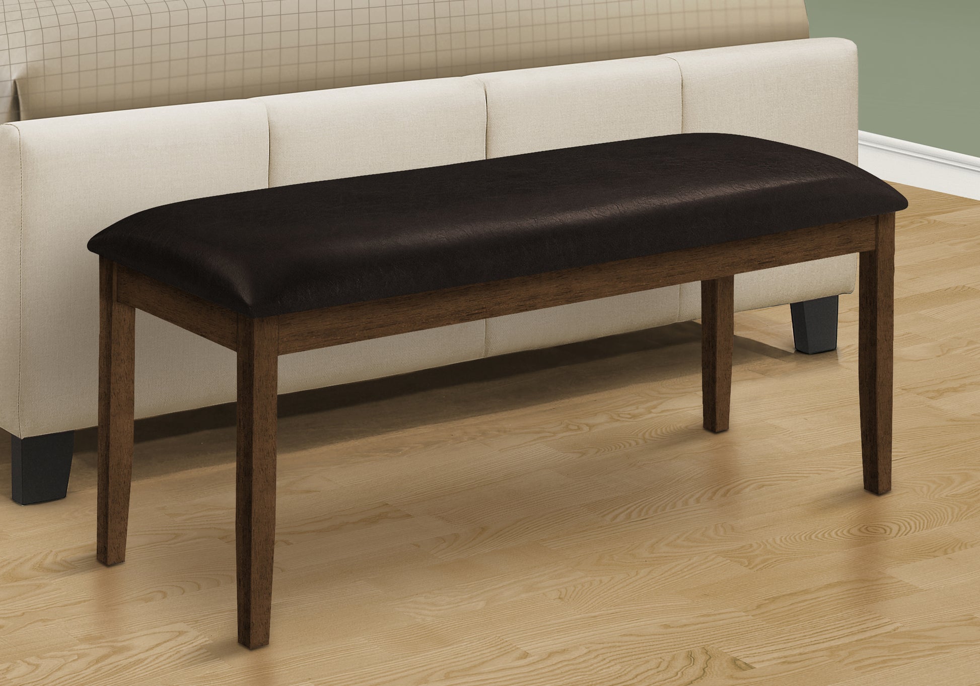 Dark brown faux leather upholstered bench with wooden legs