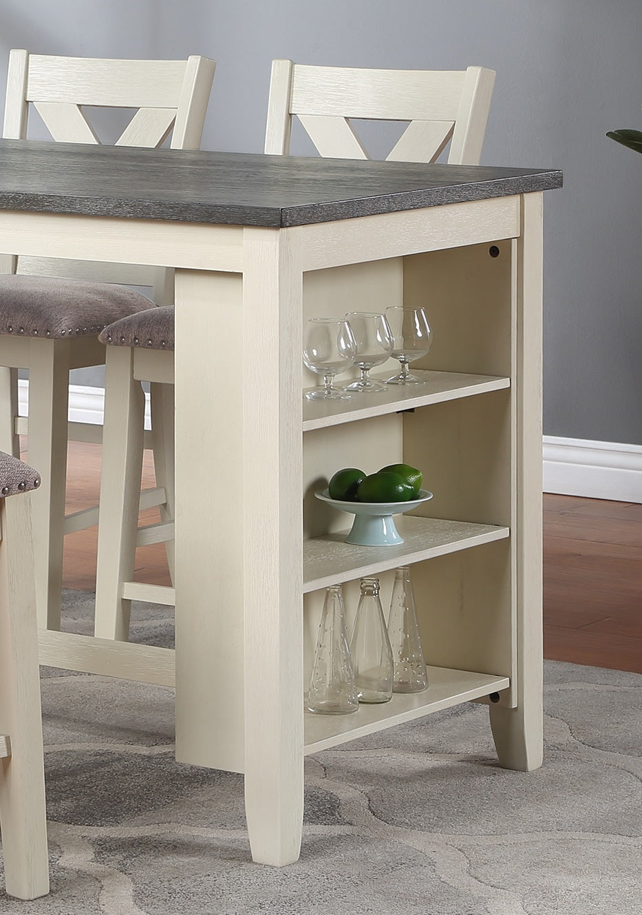 Cream white bar height table with gray wood top and open shelving
