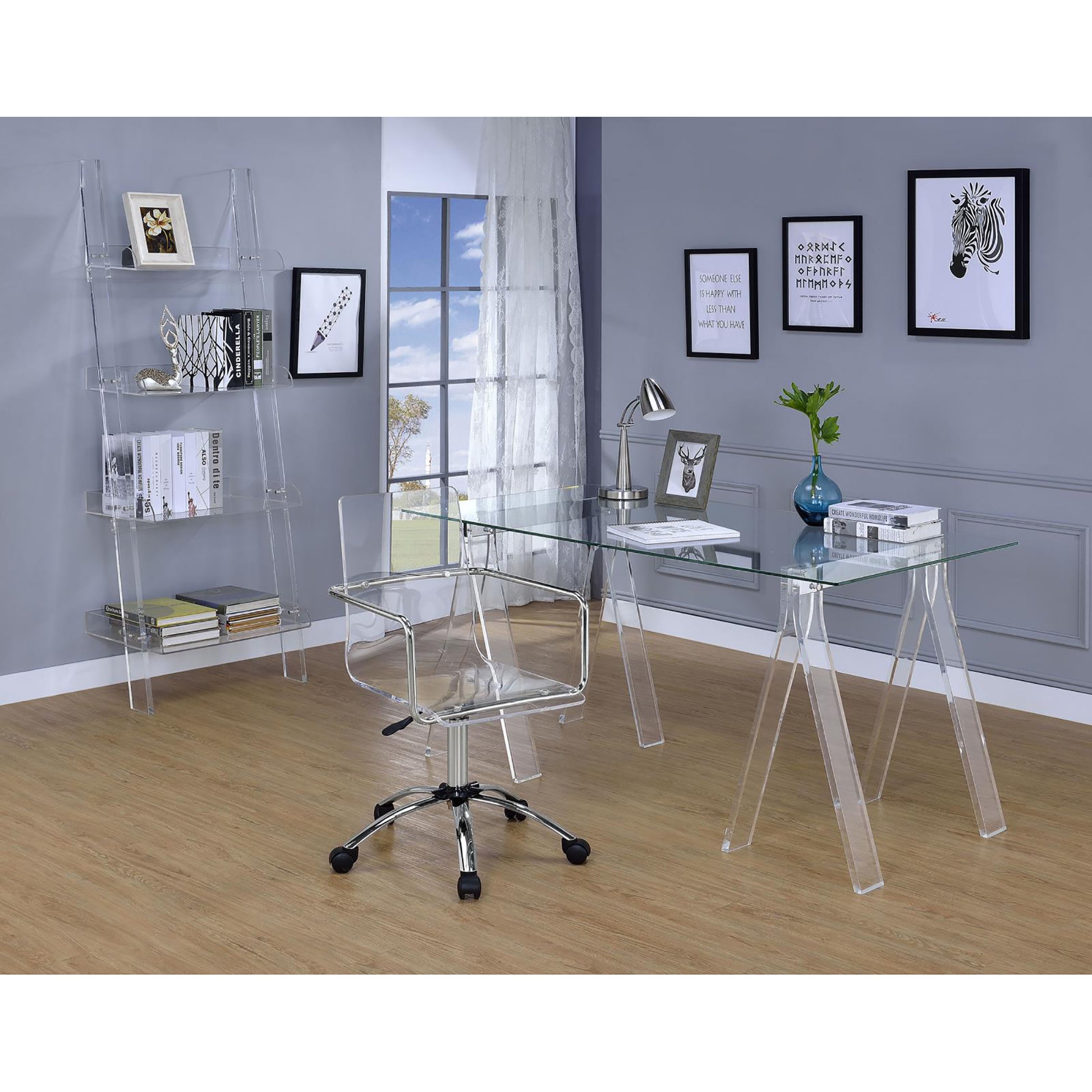 Clear acrylic ladder bookshelf with books and decor